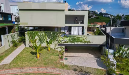 Belíssima casa para venda e locação de 575M²,  4 suítes, living integrado ao espaço gourmet, piscin