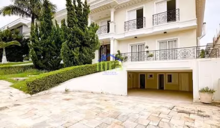 Belíssima casa à venda de 500M², 4 suítes, ambientes integrados ao espaço gourmet, 5 vagas no Resid
