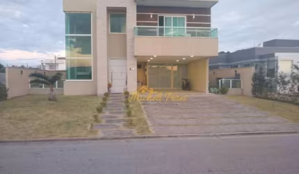 Luxuosa casa duplex alto padrão no condomínio Alphaville I, 4 quartos com área gourmet e piscina, á venda - 305 m² - Mar do Norte - Rio das Ostras/RJ