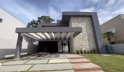 Casa duplex com 5 suítes em Alphaville Litoral Norte I