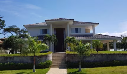 Casa com 4 dormitórios à venda, 390 m² por R$ 4.950.000 - Encontro das Águas - Lauro de Freitas/BA