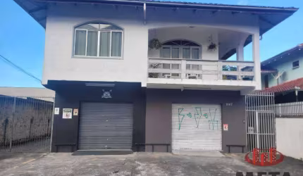Casa com 4 dormitórios à venda por R$ 1.500.000 - Iririú - Joinville/SC