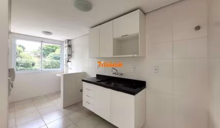 Apartamento com dois dormitórios e vaga coberta próximo à Feevale para aluguel bairro Vila Nova