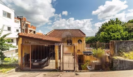 Casa de 4 dormitórios no bairro Camaquã