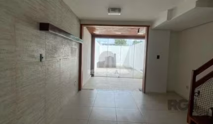 Casa 3 dormitórios à venda Guarujá Porto Alegre/RS