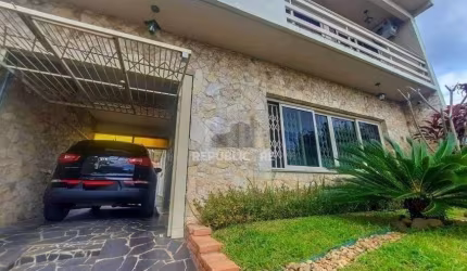 Excelente casa com 3 dormitórios e 3 vagas de garagem