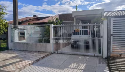 Casa de 2 dormitórios, com banheiro social, e um living em 2 ambientes, com banh