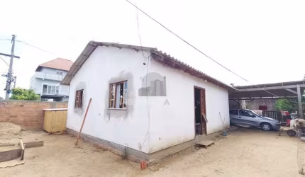 Casa 2 dormitórios à venda Guajuviras Canoas/RS