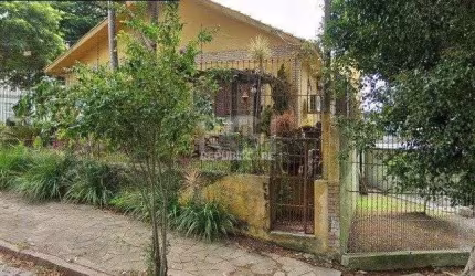 Casa 4 dormitórios à venda Parque Santa Fé Porto Alegre/RS