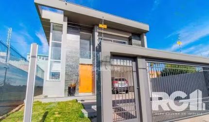 Casa 4 dormitórios à venda Marechal Rondon Canoas/RS