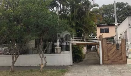 Casa/terreno medindo 200m² de privativo, 550m² totais  no bairro Partenon, 9 vag