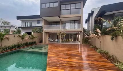 ESPETACULAR CASA TRIPLEX A VENDA, COM FUNDO PARA A MATA NO CONDOMÍNIO DO LAGO