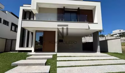 Casa com piscina em frente à praça - 5 suítes - Condomínio Alphaville II