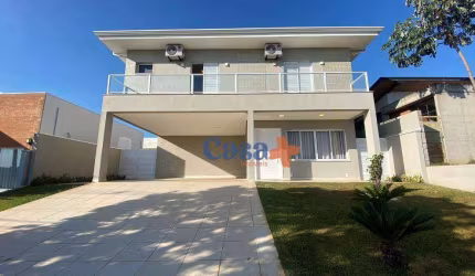 Casa com 4 dormitórios, 252 m² - venda por R$ 1.590.000,00 ou aluguel por R$ 10.835,00/mês - Condomínio Terras do Cancioneiro - Paulínia/SP