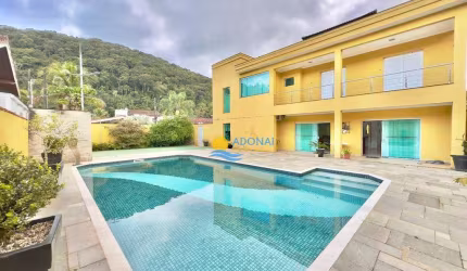 Casa com 5 dormitórios à venda, 400 m² por R$ 2.200.000,00 - Balneário Praia do Pernambuco - Guarujá/SP