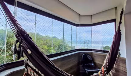 Apartamento com 2 dormitórios à venda, 75 m² por R$ 750.000,00 - Tombo - Guarujá/SP