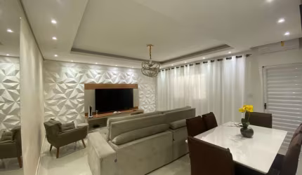 Casa com 3 dormitórios à venda, 210 m² por R$ 1.100.000,00 - Jardim Guaiuba - Guarujá/SP