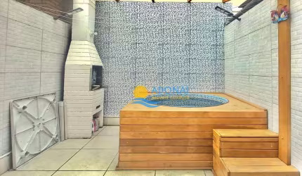Casa com 3 dormitórios à venda, 130 m² por R$ 640.000,00 - Tombo - Guarujá/SP