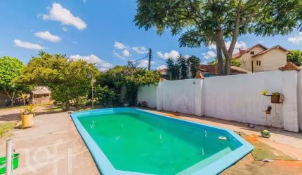 Casa com 4 quartos à venda na Rua Ary Veiga Sanhudo, 71, Belém Velho, Porto Alegre, 220 m2 por R$ 712.004