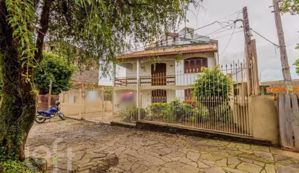 Casa com 3 quartos à venda na Rua Fontoura Xavier, 550, Cristo Redentor, Porto Alegre, 252 m2 por R$ 901.000