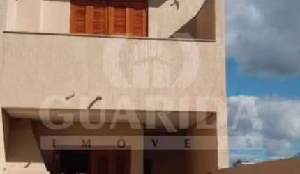 Casa com 2 quartos à venda na Rua Heitor Kramer, 640, Hípica, Porto Alegre, 124 m2 por R$ 430.000