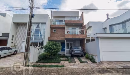 Casa em condomínio fechado com 3 quartos à venda na Rua Jorge Babot Miranda, 680, Hípica, Porto Alegre, 201 m2 por R$ 1.427.000