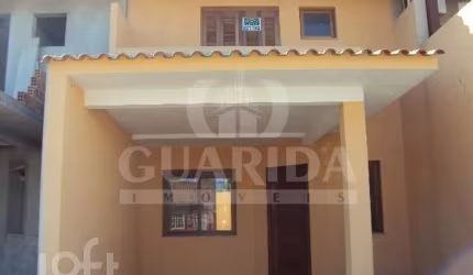 Casa com 3 quartos à venda na Rua Alexio Fagherazzi, 67, Hípica, Porto Alegre, 115 m2 por R$ 395.000