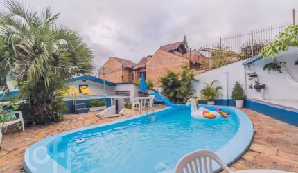 Casa com 4 quartos à venda na Rua Santo Camarata, 6, Rubem Berta, Porto Alegre, 176 m2 por R$ 742.000