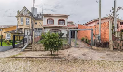 Casa com 4 quartos à venda na Rua Esteio, 220, Cavalhada, Porto Alegre, 244 m2 por R$ 790.000
