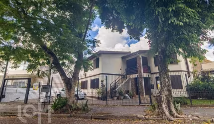 Casa com 5 quartos à venda na Rua Abílio Miller, 53, Jardim Itu Sabará, Porto Alegre, 244 m2 por R$ 800.000