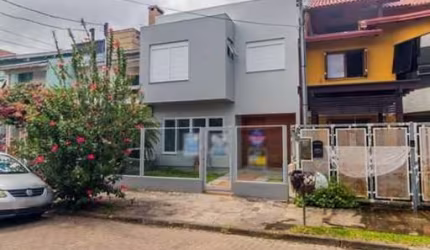 Casa em condomínio fechado com 3 quartos à venda na Rua Guatambu, 304, Hípica, Porto Alegre, 172 m2 por R$ 680.000