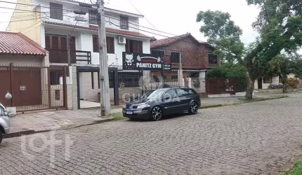 Casa com 3 quartos à venda na Rua Márcio Dias, 360, Nonoai, Porto Alegre, 370 m2 por R$ 900.000