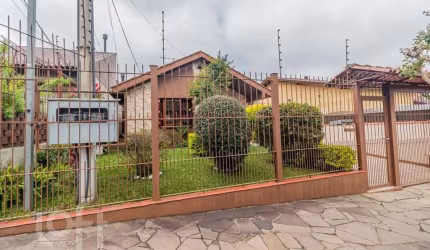 Casa com 4 quartos à venda na Rua Dário Totta, 2901, Cavalhada, Porto Alegre, 305 m2 por R$ 650.500