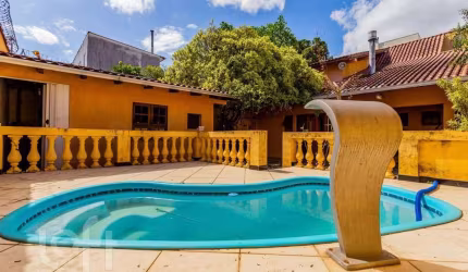 Casa com 2 quartos à venda na Rua Afonso Rodrigues, 263, Jardim Botânico, Porto Alegre, 194 m2 por R$ 1.150.000
