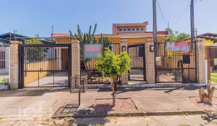 Casa com 3 quartos à venda na Rua Carmense, 165, Rubem Berta, Porto Alegre, 218 m2 por R$ 650.000