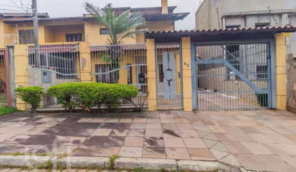 Casa com 4 quartos à venda na Rua José Ernesto Nedel, 65, Passo das Pedras, Porto Alegre, 240 m2 por R$ 617.500