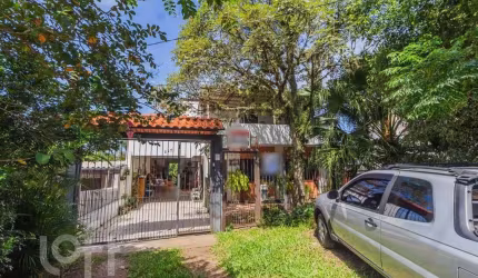 Casa em condomínio fechado com 5 quartos à venda na Avenida Vicente Monteggia, 2231, Vila Nova, Porto Alegre, 308 m2 por R$ 905.000