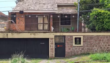 Casa com 3 quartos à venda na Avenida Deputado Aramy Silva, 277, Santa Tereza, Porto Alegre, 154 m2 por R$ 945.000
