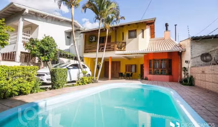 Casa com 4 quartos à venda na Rua Cacilda Yaconis Becker, 223, Rubem Berta, Porto Alegre, 300 m2 por R$ 730.000