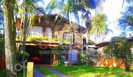 Casa com 3 quartos à venda na Estrada João Vedana, 561, Cavalhada, Porto Alegre, 200 m2 por R$ 905.000