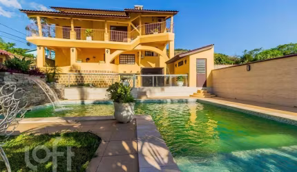 Casa com 4 quartos à venda na Rua Maurílio Ferreira, 320, Campo Novo, Porto Alegre, 320 m2 por R$ 1.850.000