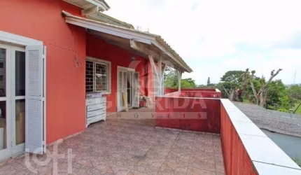 Casa com 4 quartos à venda na Avenida Cinco de Novembro, 346, Teresópolis, Porto Alegre, 180 m2 por R$ 490.000