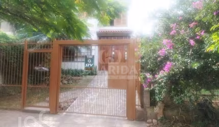 Casa com 3 quartos à venda na Rua Josué Guimarães, 258, Espírito Santo, Porto Alegre, 181 m2 por R$ 595.000