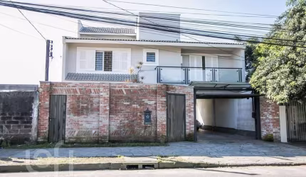 Casa com 6 quartos à venda na Rua Arapei, 228, Nonoai, Porto Alegre, 500 m2 por R$ 1.200.000