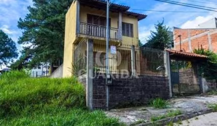 Casa com 3 quartos à venda na Rua Sol Nascente, 145, Lomba do Pinheiro, Porto Alegre, 85 m2 por R$ 401.000