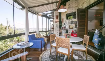 Casa em condomínio fechado com 4 quartos à venda na Rua Erechim, 100, Nonoai, Porto Alegre, 331 m2 por R$ 1.050.000