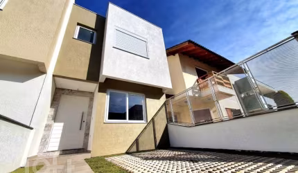 Casa em condomínio fechado com 2 quartos à venda na Rua Walter Porto Filho, 271, Mário Quintana, Porto Alegre, 106 m2 por R$ 490.000