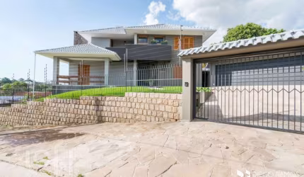 Casa com 3 quartos à venda na Rua Doutor Paulino Guerra, 362, Jardim Itu Sabará, Porto Alegre, 258 m2 por R$ 1.290.000