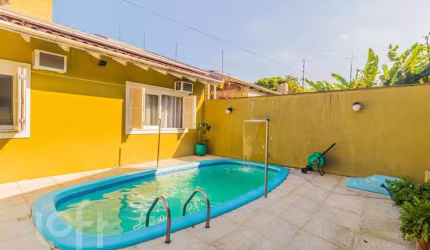 Casa com 4 quartos à venda na Avenida Mário Meneghetti, 694, Passo das Pedras, Porto Alegre, 460 m2 por R$ 1.800.000