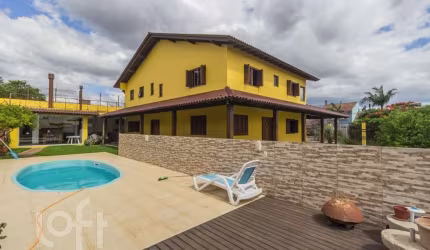 Casa com 4 quartos à venda na Rua Hermínio Leal de Albuquerque, 1025, Rubem Berta, Porto Alegre, 509 m2 por R$ 1.698.000